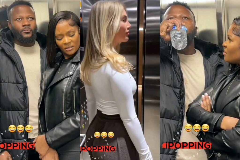 A man enters the elevator with his girlfriend, and when another woman enters, he makes every effort not to notice her tight outfit