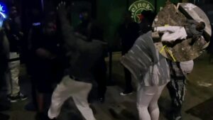 Chicago Bouncer Pushes Elderly Man, Resulting in Birthday Injury on Construction Curb